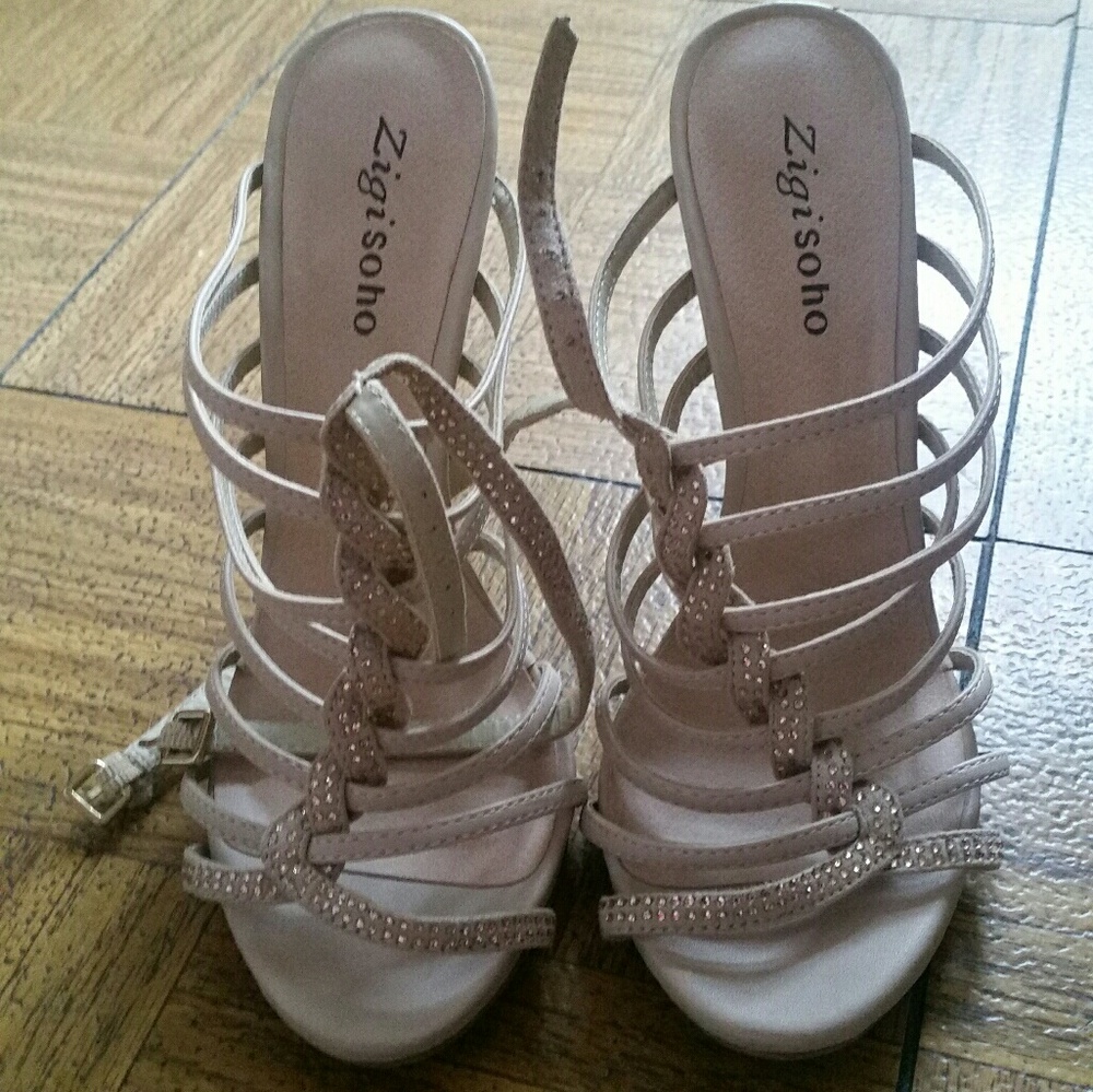 Nude strappy heels.